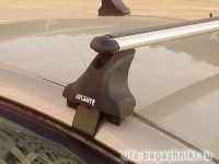 Багажник на крышу Hyundai Solaris sedan, Атлант, аэродинамические дуги, опора E