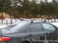 Багажник на крышу Toyota Corolla, Атлант: аэродинамические дуги и опоры типа Е