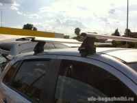 Багажник на крышу Mitsubishi ASX, без рейлингов, Атлант, аэродинамические дуги, опора Е