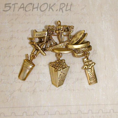 Брошь "Фильм, фильм, фильм!" под античное золото