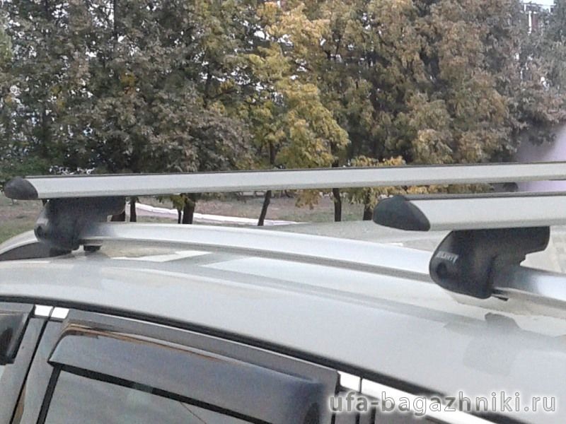 Багажник на крышу Volkswagen Tiguan 2007-16, Атлант, крыловидные дуги на рейлинги