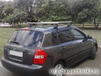 Багажник на крышу Kia Cerato LD 2004-09, Атлант, аэродинамические дуги