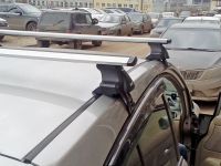 Универсальный багажник на крышу Nissan Tiida (sedan/hatchback 2004-2013) - D-Lux 1, крыловидные дуги