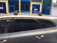 Багажник на крышу Kia Ceed sw universal 2012-..., Turtle Air 2, аэродинамические дуги на интегрированные рейлинги (серебристый цвет)