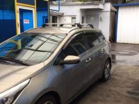 Багажник на крышу Kia Ceed sw universal 2012-..., Turtle Air 2, аэродинамические дуги на интегрированные рейлинги (серебристый цвет)