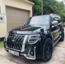 Бампер передний, тюнинг вариант на Mitsubishi Pajero 4