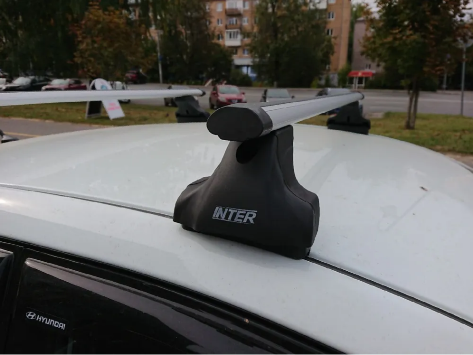 Багажник на крышу INTER Spectr в штатные места с аэродинамическими дугами (53 мм)