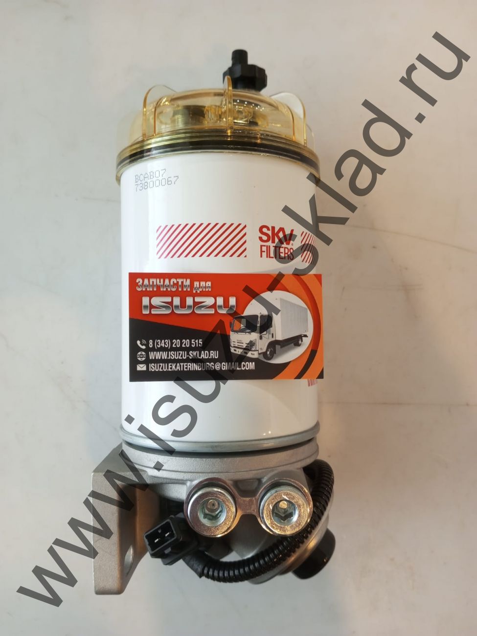 Фильтр топливный в сборе с насосом подкачки npr75/nmr85/nqr90 с подогревом Фильтр топливный в сборе с насосом подкачки npr75/nmr85/nqr90 с подогревом