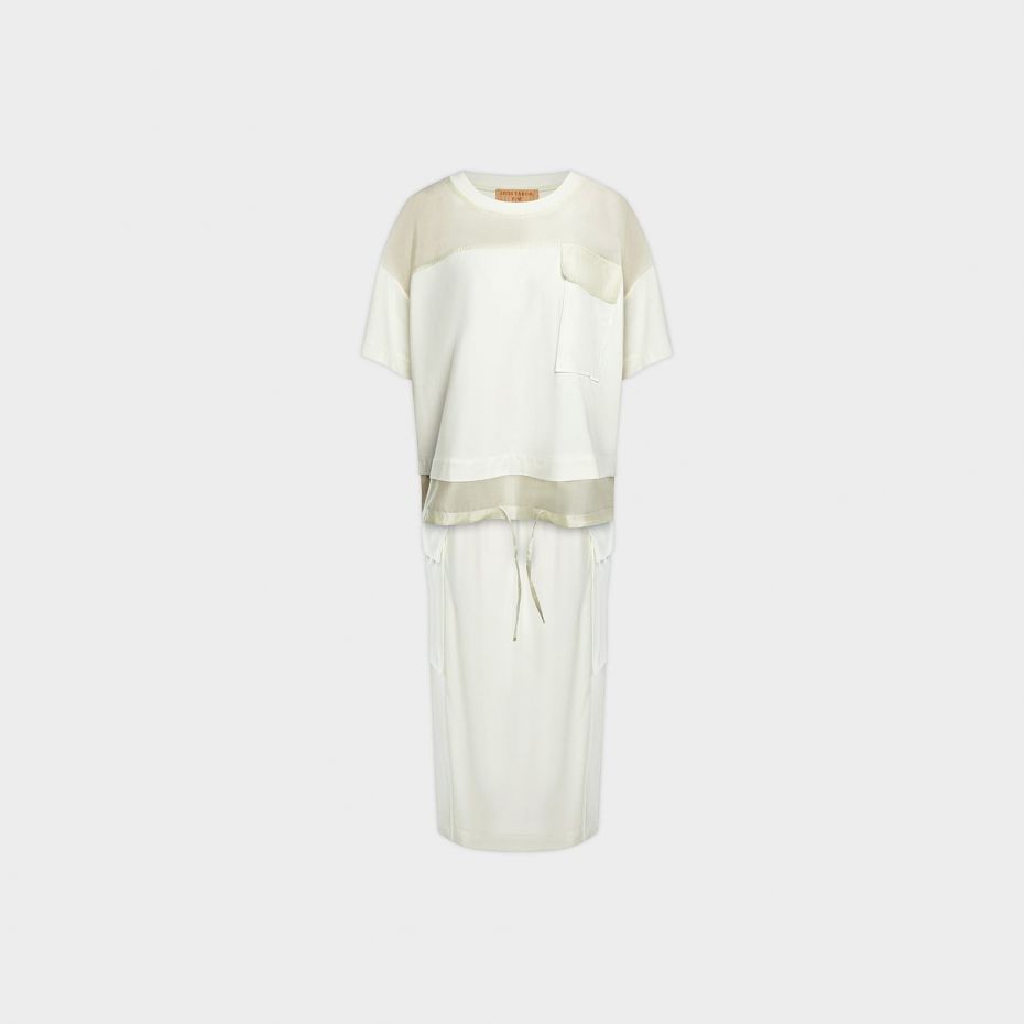 Молочный костюм из вискозы с футболкой и юбкой с прозрачными вставками